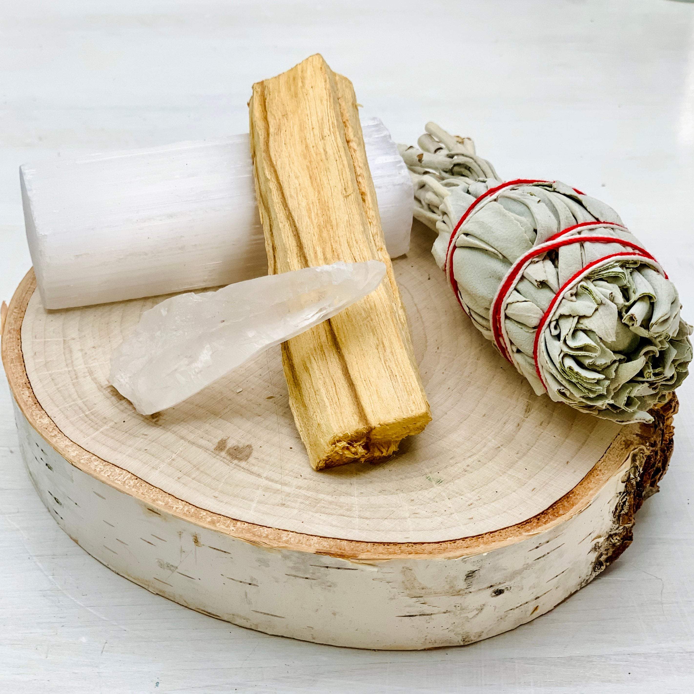 Cleansing Bundle: Selenite Wand, White Sage, Paleo Wood Stick & Clear Quartz Crystal. - Interiors in Balance