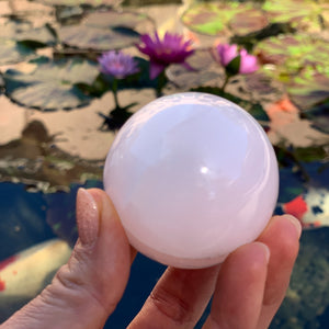 Pink Calcite Sphere, Glows Florescent