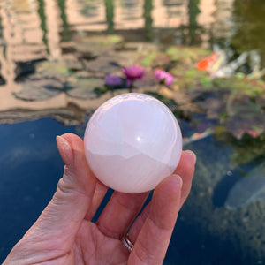 Pink Calcite Sphere, Glows Florescent